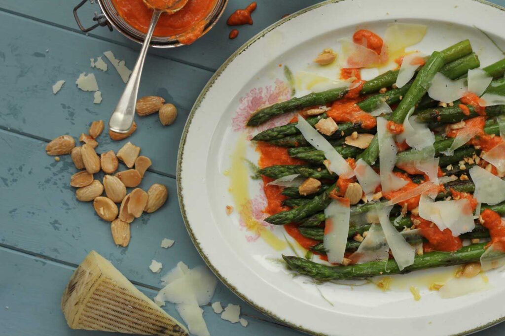Grilled Asparagus with Manchego Cheese and Romesco Sauce