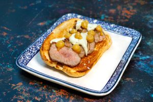 Bocadillo of Secreto Iberico, Roast Apple Puree and Blue Cheese Sauce