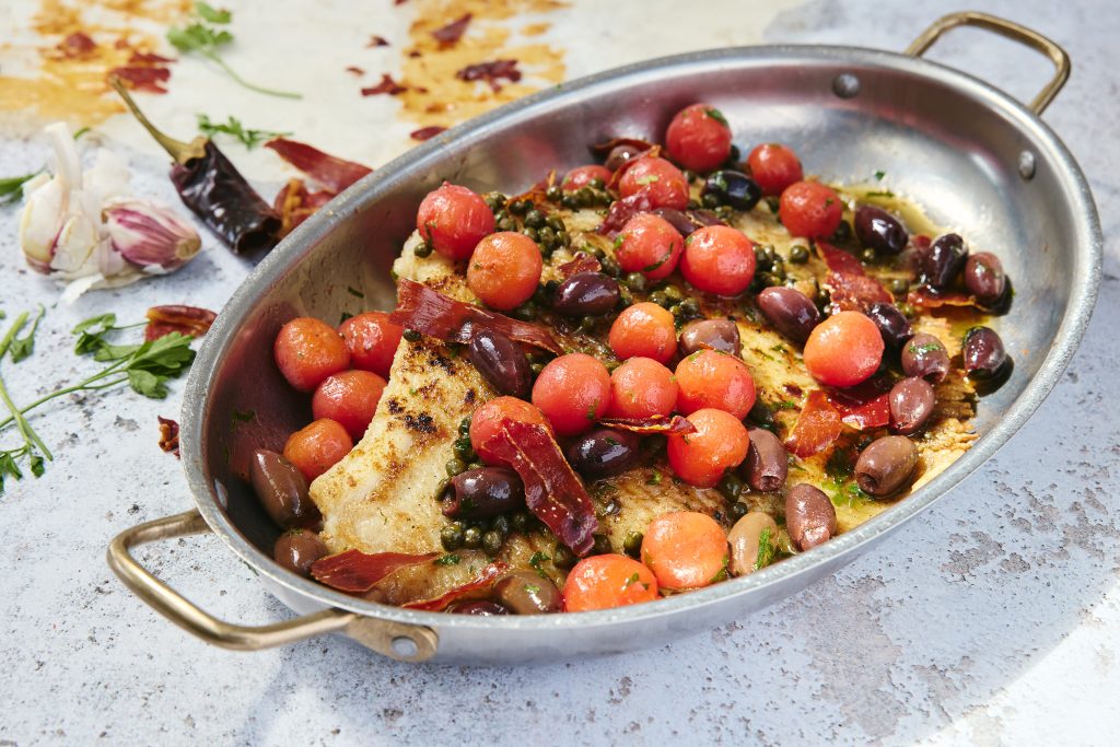 Skate Wing with Crispy Serrano Ham, Tomato, Black Olive and Caper Nut Brown Butter