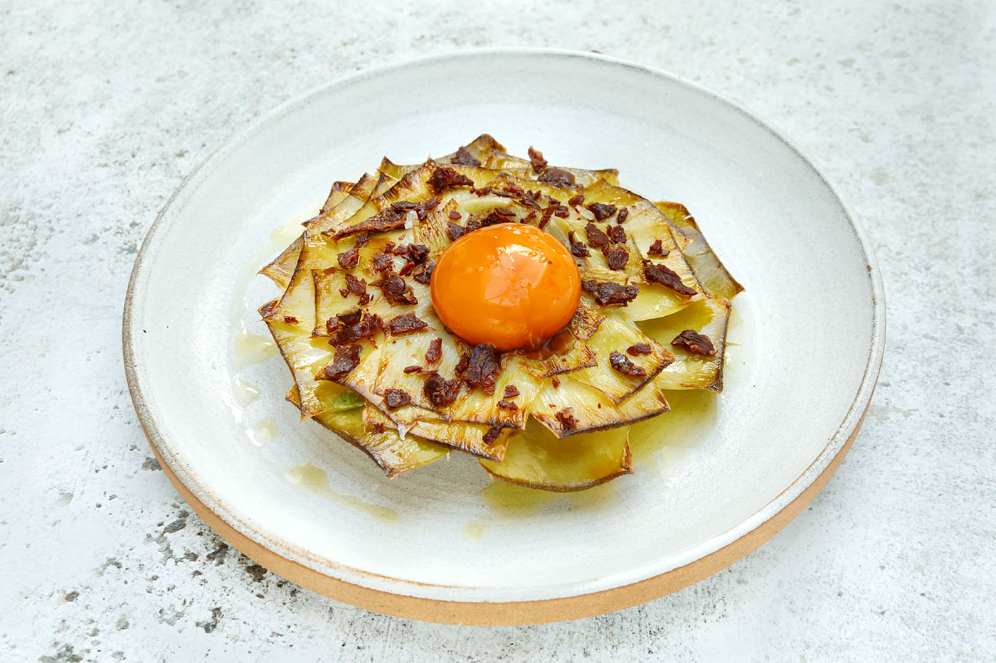 Confit Artichoke Flower with Soy Cured Egg Yolk and Smoked Cecina Crumb